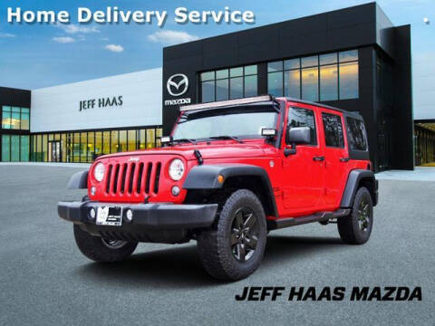 2016 Jeep Wrangler Unlimited for sale at JEFF HAAS MAZDA in Houston TX