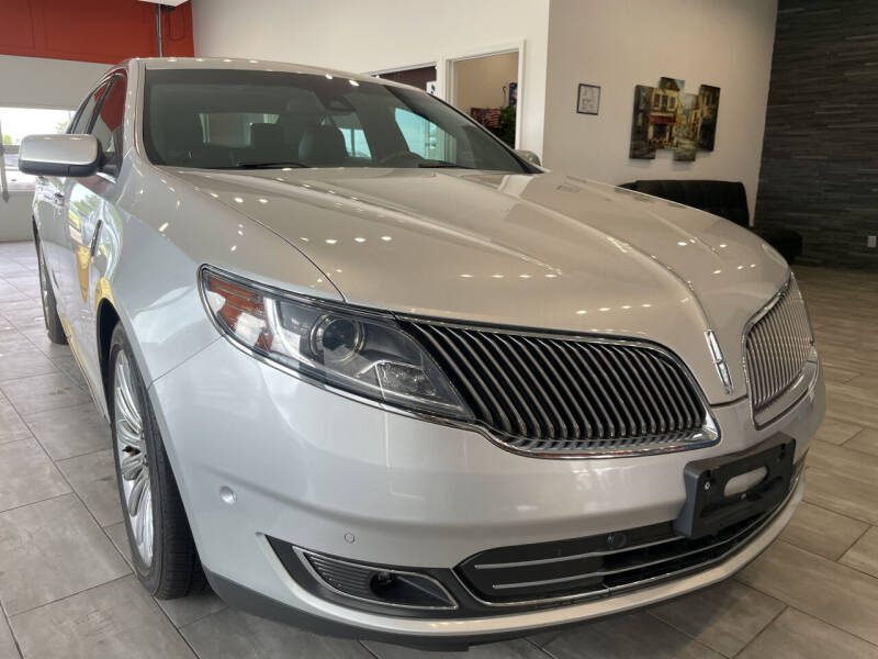 2014 Lincoln MKS for sale at Evolution Autos in Whiteland IN