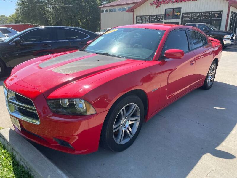 2014 Dodge Charger for sale at Azteca Auto Sales LLC in Des Moines IA