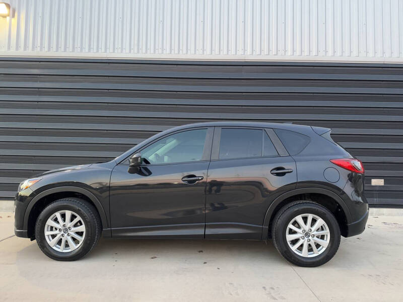 2013 Mazda CX-5 for sale at FAST LANE AUTO SALES in San Antonio TX