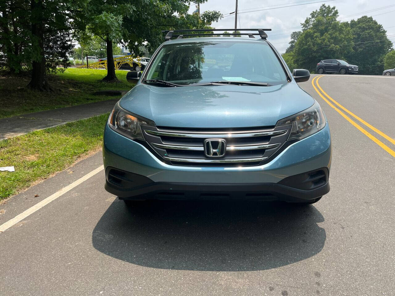 Preowned 2014 HONDA CR-V LX AWD 4dr SUV for sale by The Auto Finders Car Dealership of Durham in Durham, NC