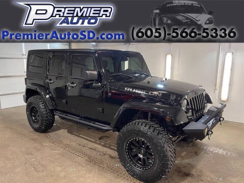 2015 Jeep Wrangler Unlimited for sale at Premier Auto in Sioux Falls SD