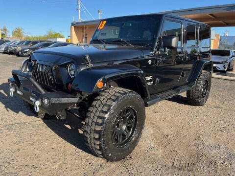 2013 Jeep Wrangler Unlimited for sale at Car Dealers LLC in Tucson AZ