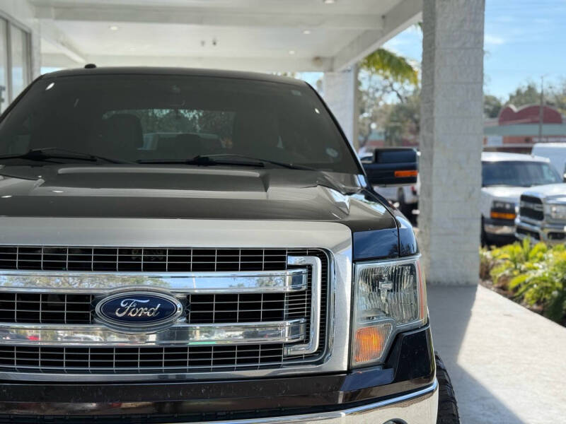 Used 2013 Ford F-150 XLT with VIN 1FTFW1CT7DFD08936 for sale in Tampa, FL