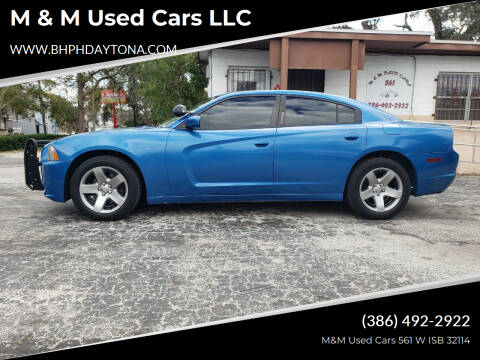 2011 Dodge Charger for sale at M & M Used Cars LLC in Daytona Beach FL