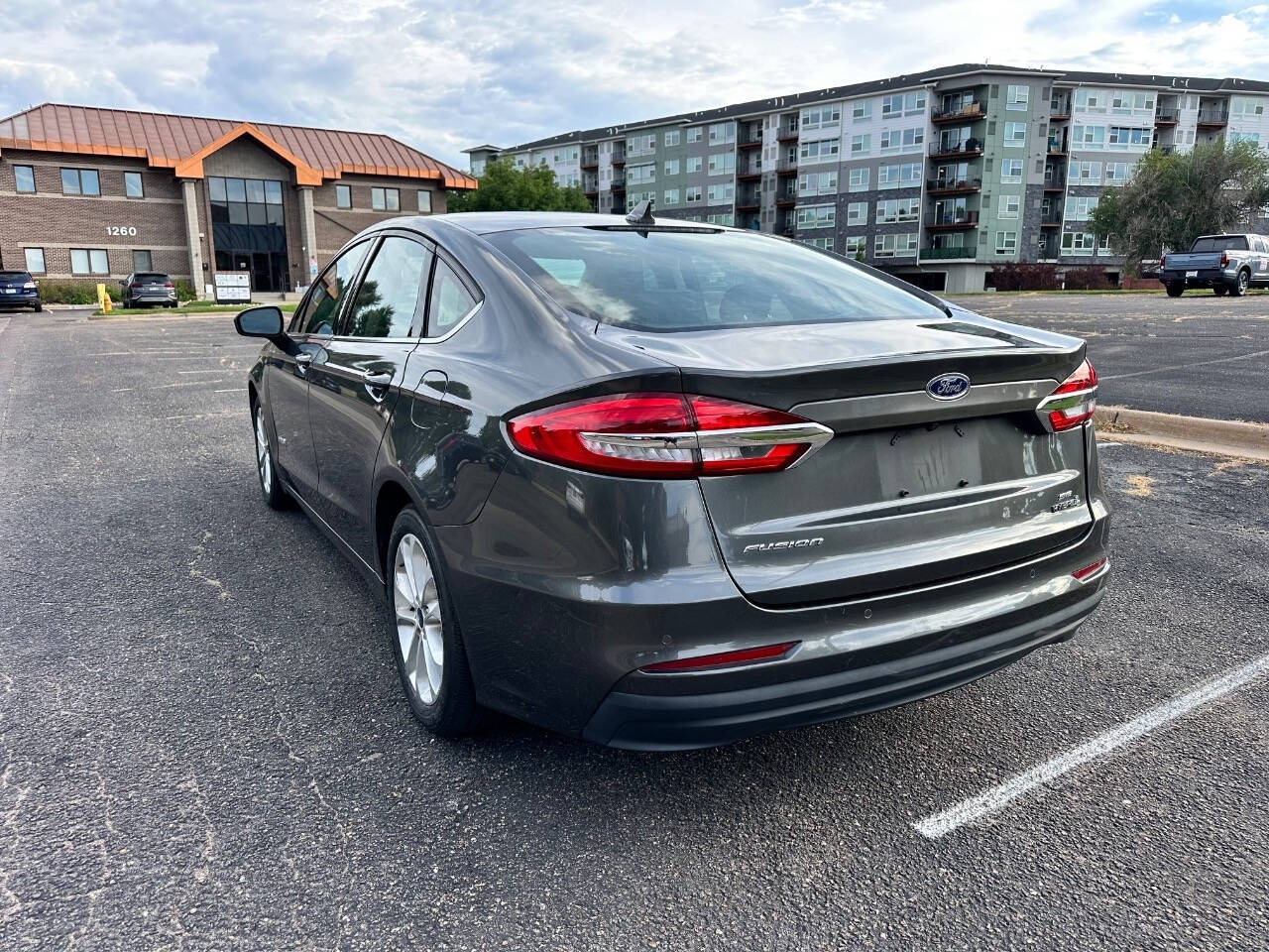 2019 Ford Fusion Hybrid for sale at AMZ Autos, LLC in Denver, CO