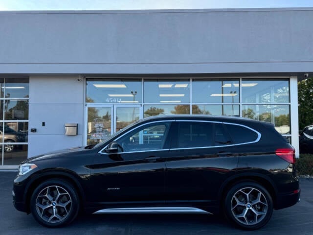 2016 BMW X1 for sale at Opus Motorcars in Utica, MI