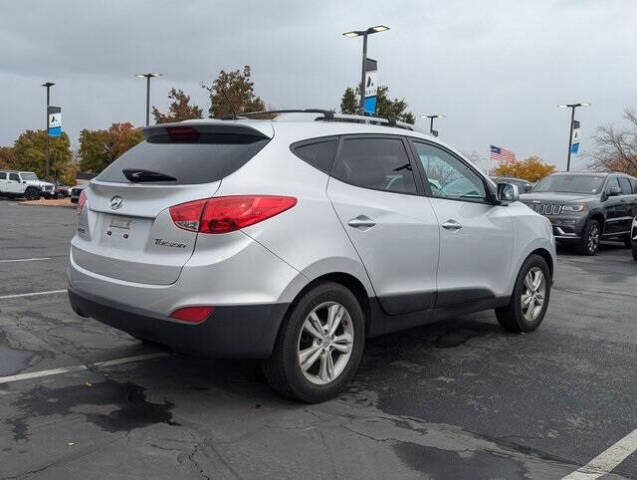 2011 Hyundai TUCSON for sale at Axio Auto Boise in Boise, ID