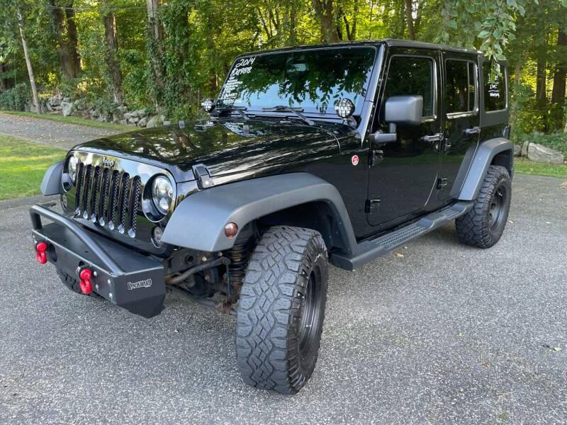 2014 Jeep Wrangler Unlimited for sale at Lou Rivers Used Cars in Palmer MA