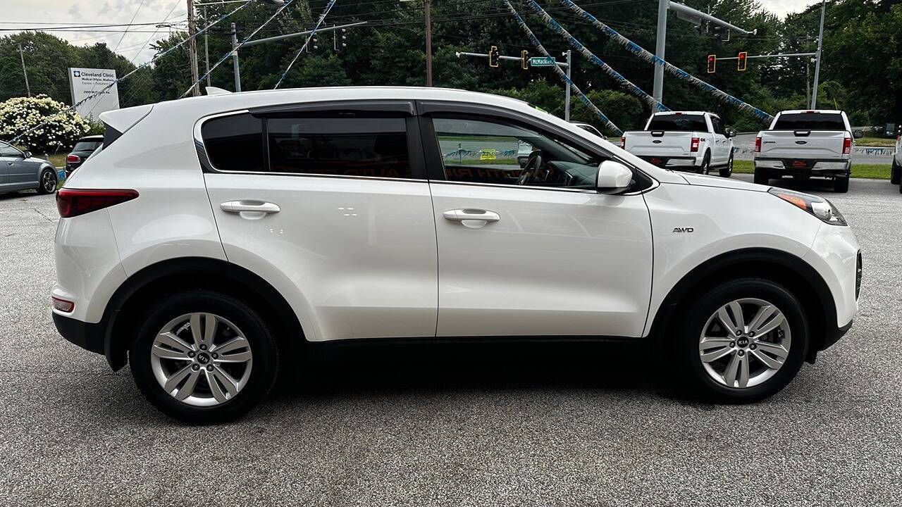 2017 Kia Sportage for sale at North Ridge Auto Center LLC in Madison, OH