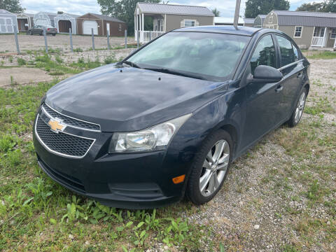2011 Chevrolet Cruze for sale at HEDGES USED CARS in Carleton MI