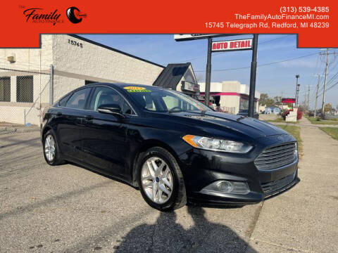 2013 Ford Fusion for sale at The Family Auto Finance in Redford MI