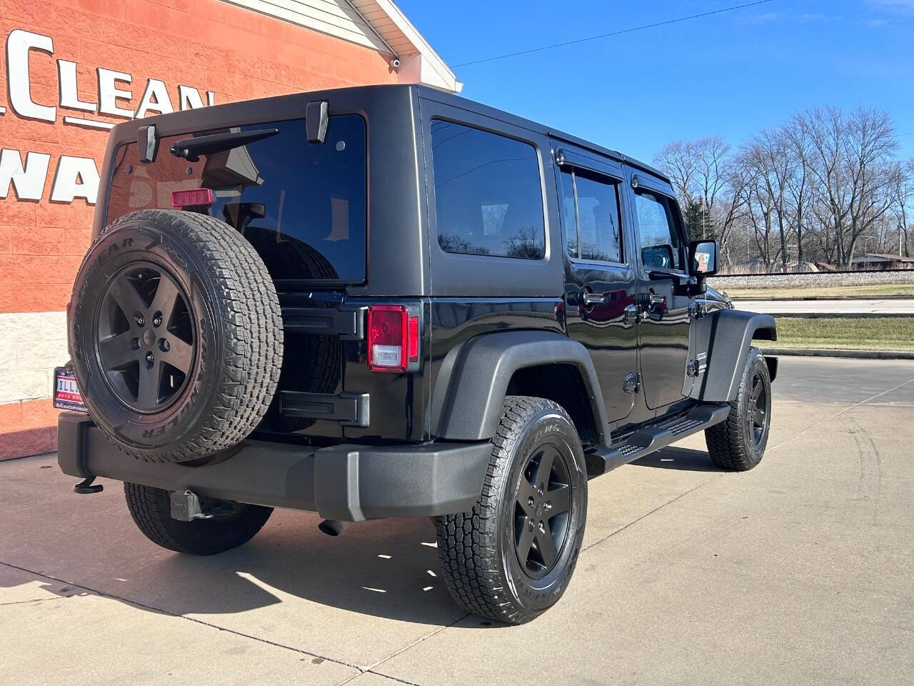 2014 Jeep Wrangler Unlimited for sale at Illinois Auto Wholesalers in Tolono, IL