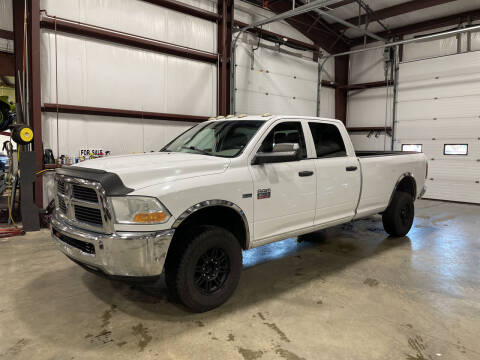 2011 RAM Ram Pickup 2500 for sale at Hometown Automotive Service & Sales in Holliston MA