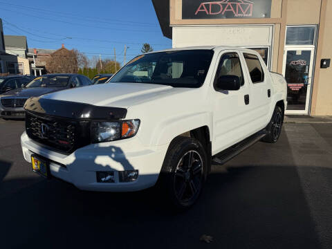 2014 Honda Ridgeline for sale at ADAM AUTO AGENCY in Rensselaer NY