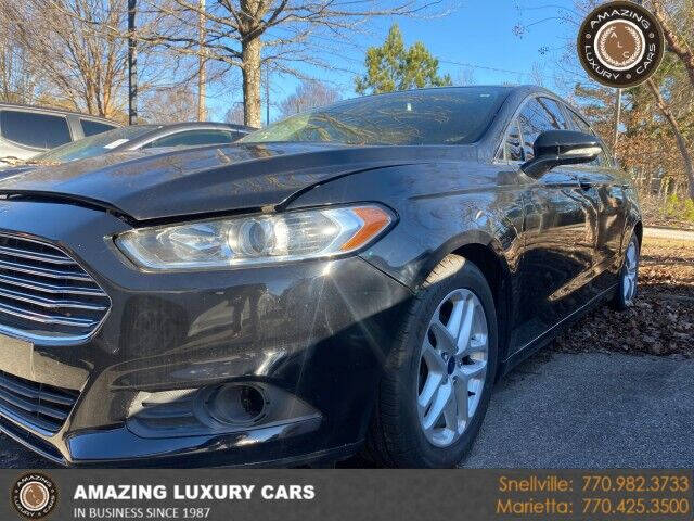 2016 Ford Fusion for sale at Amazing Luxury Cars in Snellville GA