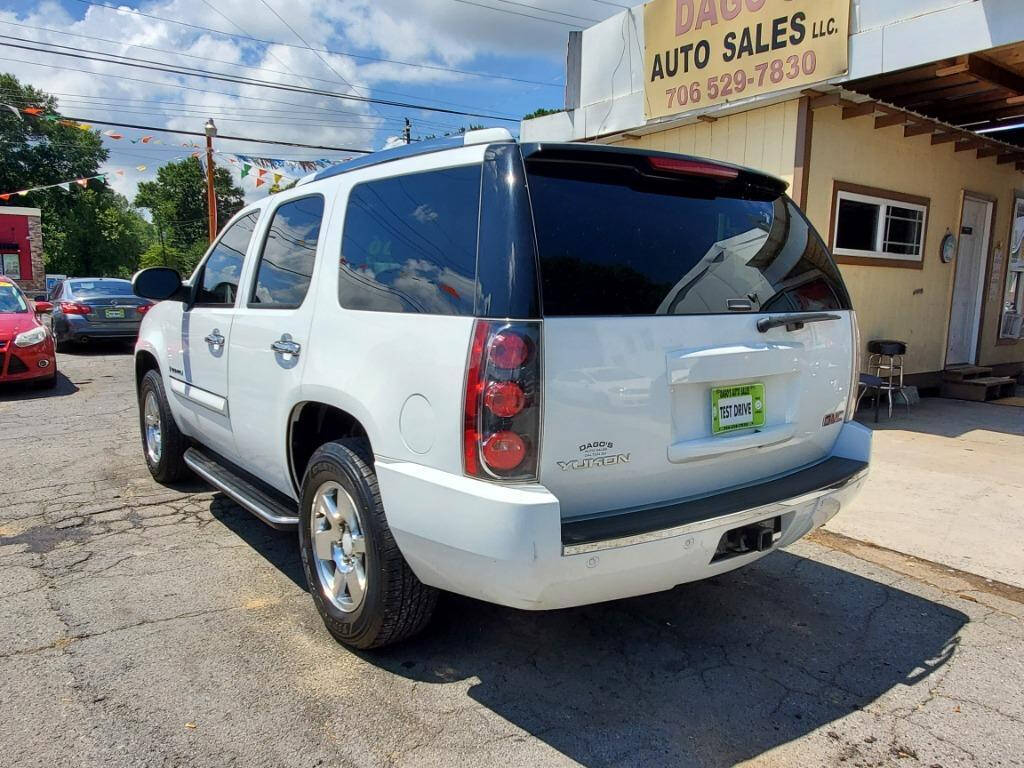 2007 GMC Yukon for sale at DAGO'S AUTO SALES LLC in Dalton, GA