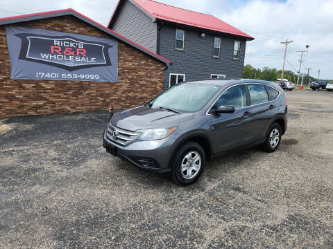 2013 Honda CR-V for sale at Rick's R & R Wholesale, LLC in Lancaster OH