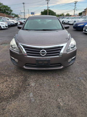 2013 Nissan Altima for sale at Right Choice Automotive in Rochester NY