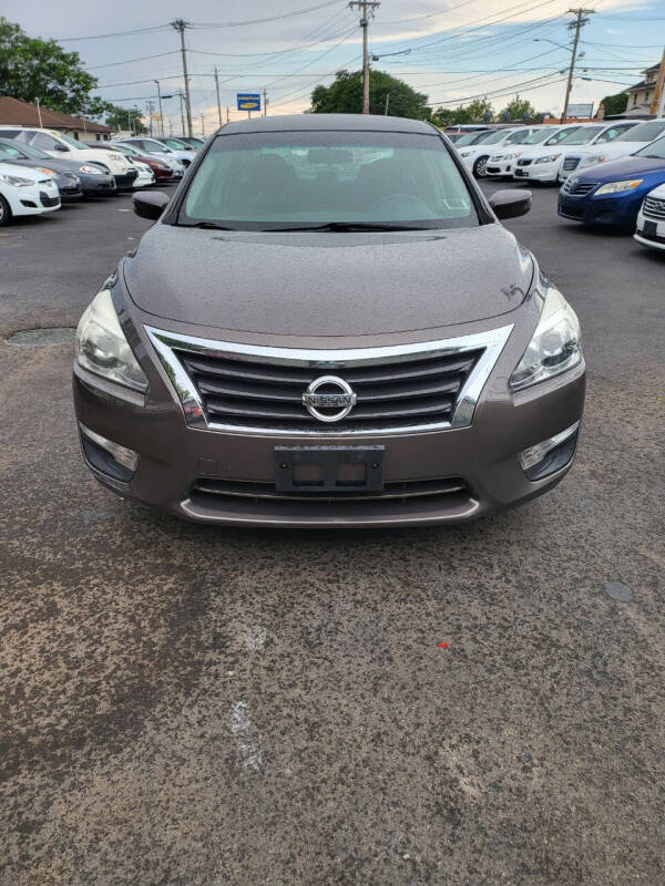 2013 Nissan Altima for sale at Right Choice Automotive in Rochester NY