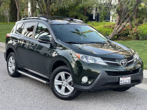 2013 Toyota RAV4 for sale at MILLENNIUM MOTORS in Van Nuys CA