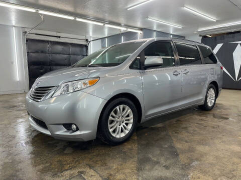 2012 Toyota Sienna for sale at Hibriten Auto Mart in Lenoir NC