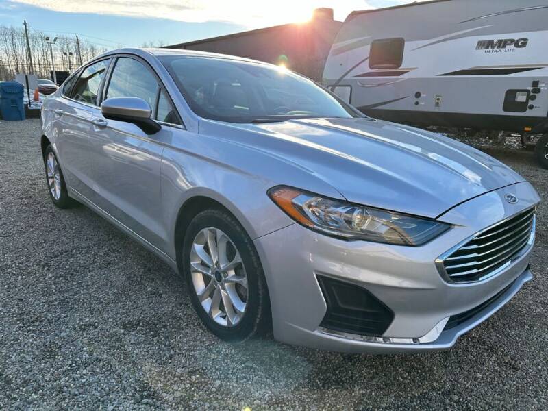 2019 Ford Fusion Hybrid for sale at TIM'S AUTO SOURCING LIMITED in Tallmadge OH