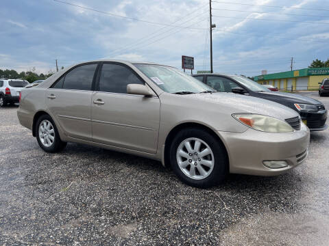 2003 Toyota Camry for sale at Ron's Used Cars in Sumter SC