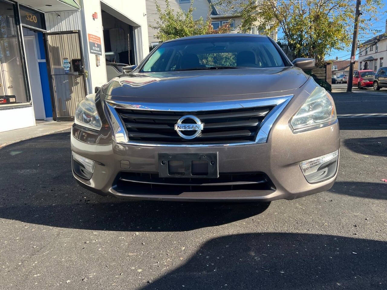 2014 Nissan Altima for sale at MBM Group LLC Auto Sales in Kearny, NJ