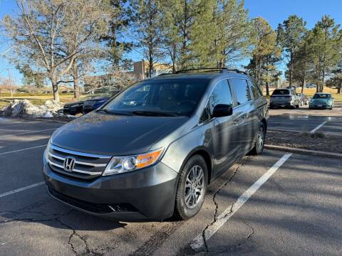 2011 Honda Odyssey for sale at QUEST MOTORS in Englewood CO