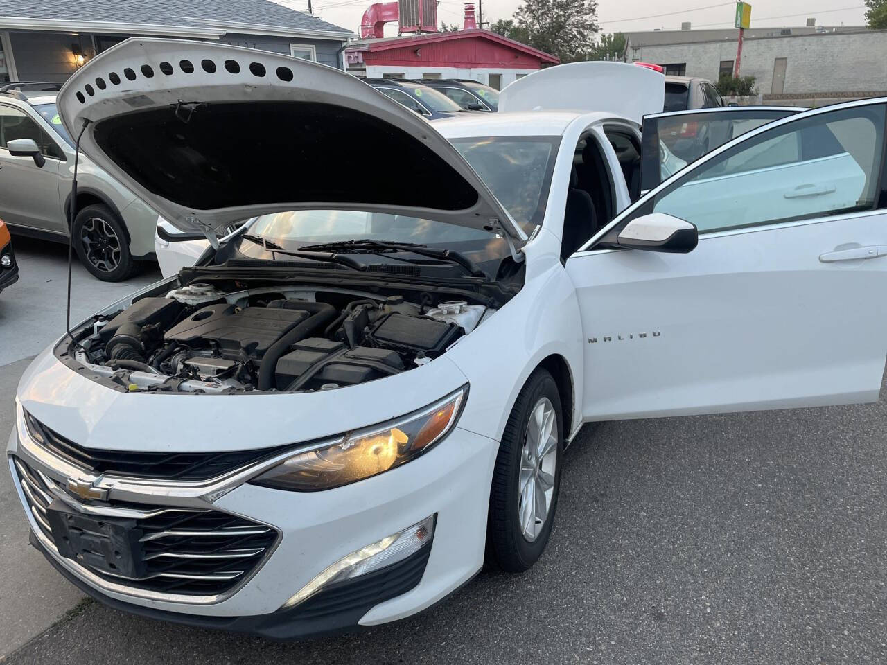 2019 Chevrolet Malibu for sale at Ganda Auto Sales in Denver, CO