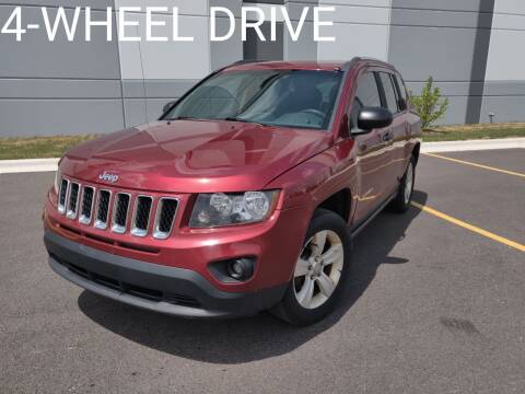 2014 Jeep Compass for sale at ACTION AUTO GROUP LLC in Roselle IL