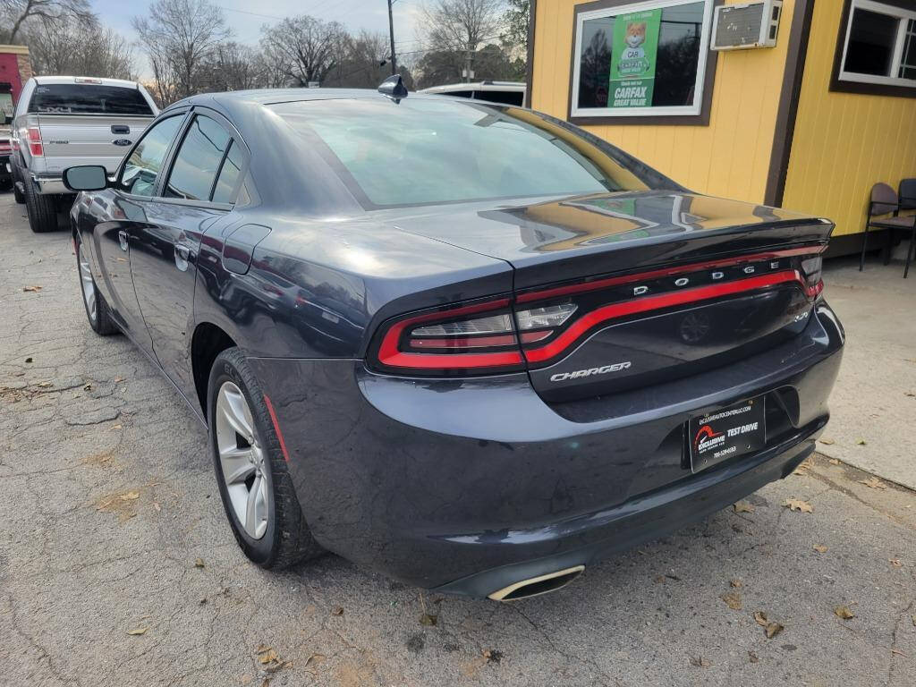 2017 Dodge Charger for sale at DAGO'S AUTO SALES LLC in Dalton, GA