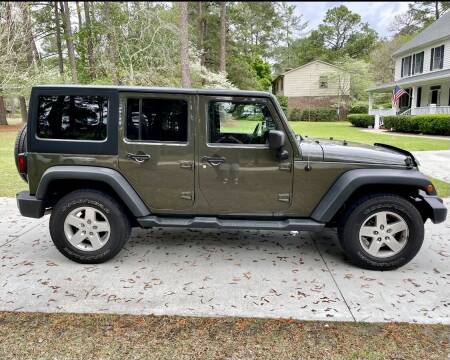 2015 Jeep Wrangler Unlimited for sale at Poole Automotive in Laurinburg NC