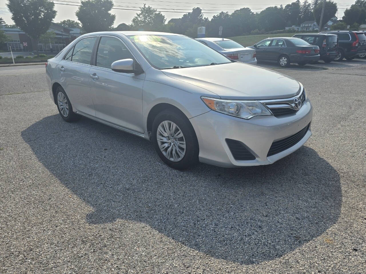 2012 Toyota Camry for sale at QUEENSGATE AUTO SALES in York, PA