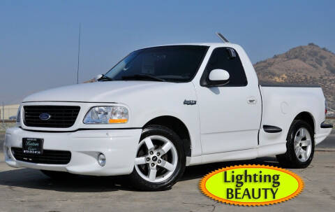 2004 Ford F-150 SVT Lightning for sale at Kustom Carz in Pacoima CA
