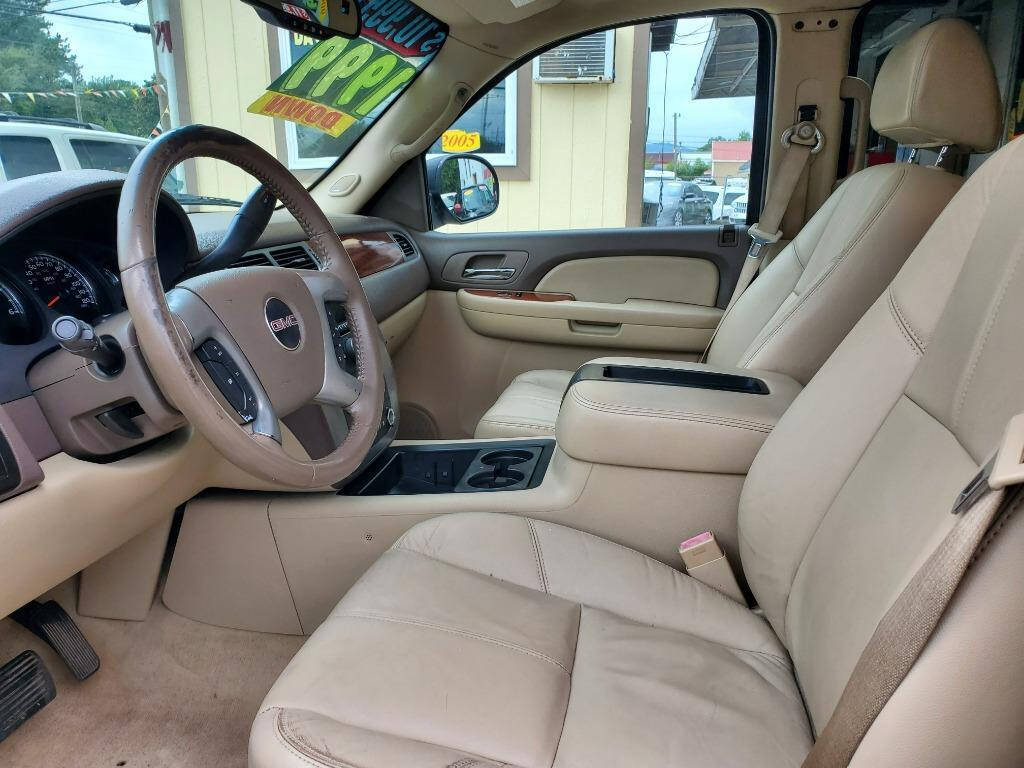 2008 GMC Yukon for sale at DAGO'S AUTO SALES LLC in Dalton, GA