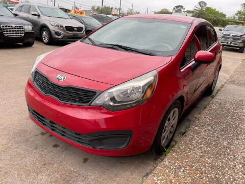 2015 Kia Rio for sale at Sam's Auto Sales in Houston TX