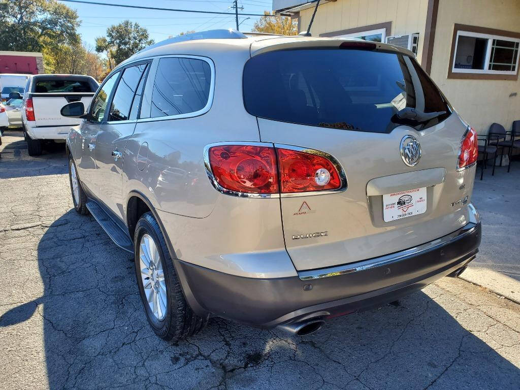 2009 Buick Enclave for sale at DAGO'S AUTO SALES LLC in Dalton, GA