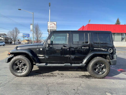 2013 Jeep Wrangler Unlimited for sale at Select Auto Group in Wyoming MI