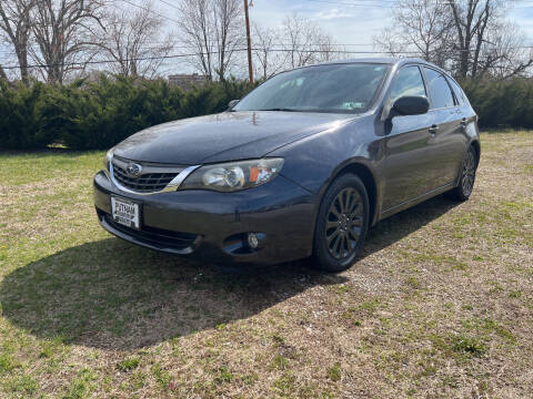 2009 Subaru Impreza for sale at PUTNAM AUTO SALES INC in Marietta OH