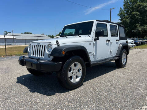 2015 Jeep Wrangler Unlimited for sale at Carworx LLC in Dunn NC