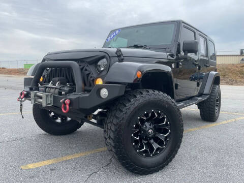 2015 Jeep Wrangler Unlimited for sale at 4 Brothers Auto Sales LLC in Brookhaven GA