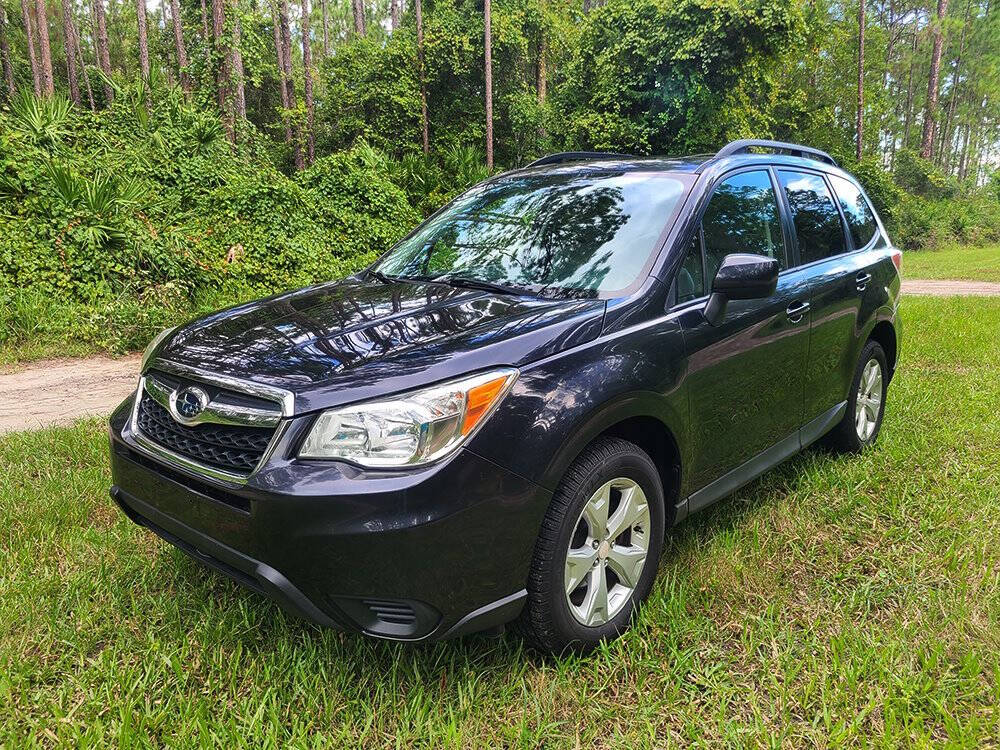 2014 Subaru Forester for sale at Flagler Auto Center in Bunnell, FL