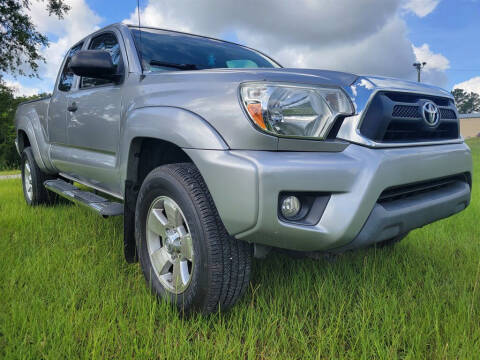 2015 Toyota Tacoma for sale at Connected Auto Group in Macon GA
