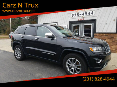 2015 Jeep Grand Cherokee for sale at Carz N Trux in Twin Lake MI