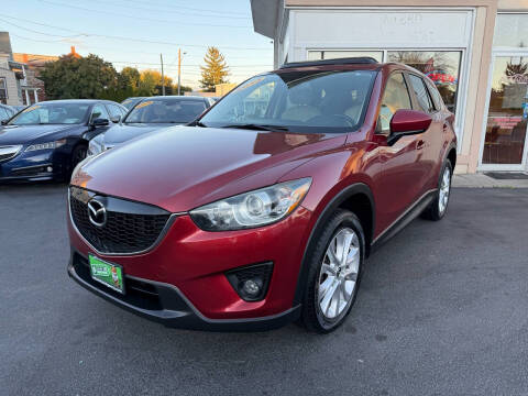 2013 Mazda CX-5 for sale at ADAM AUTO AGENCY in Rensselaer NY