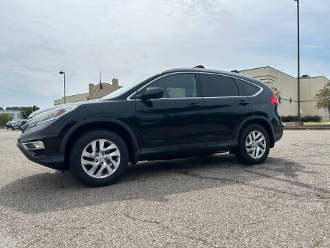 2015 Honda CR-V for sale at Familia Auto Group LLC in Massillon OH