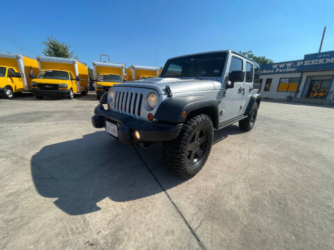 2012 Jeep Wrangler Unlimited for sale at Peek Motor Company Inc. in Houston TX