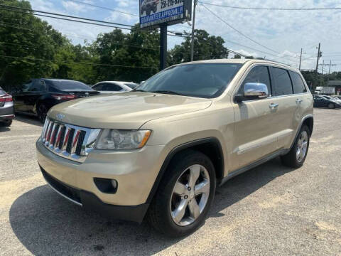 2011 Jeep Grand Cherokee for sale at SELECT AUTO SALES in Mobile AL
